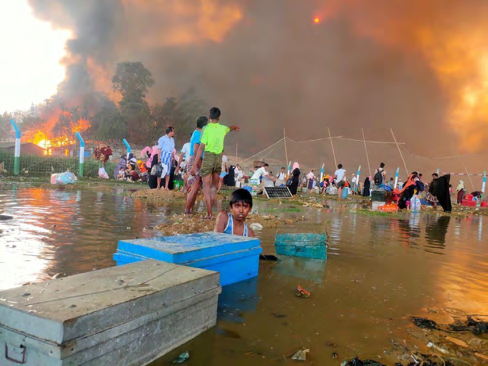 Refugees nearby as fire spreads in camp 8E