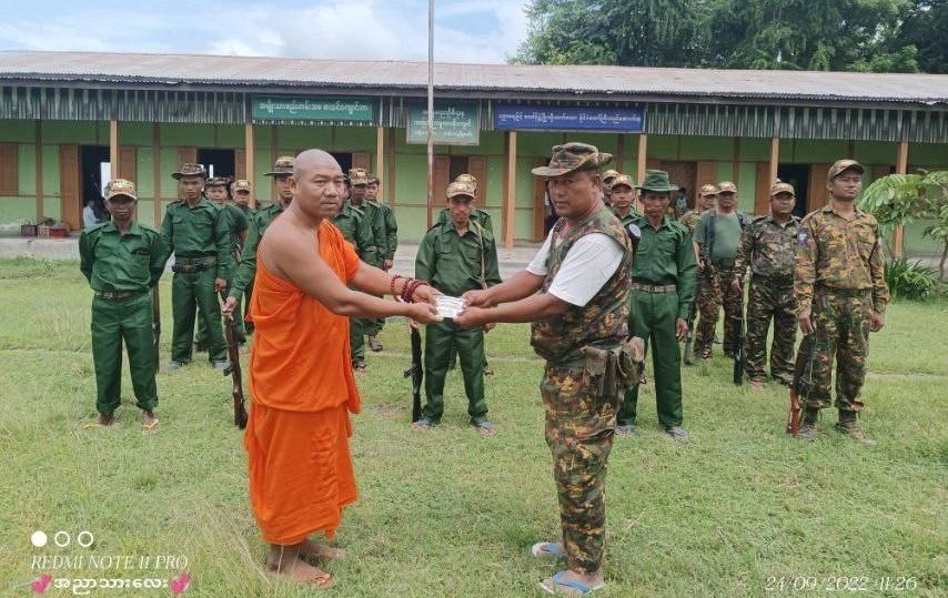 Pyu Saw Htee leader U Wathawa received the donation from military official on 21 Sep 2022.